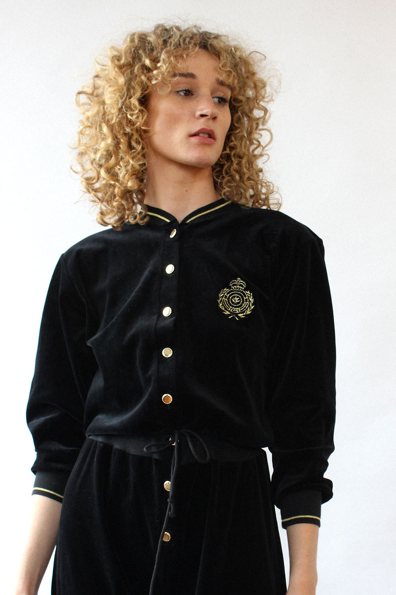 Black jumpsuit with gold buttons discount