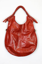 rusty red leather hobo