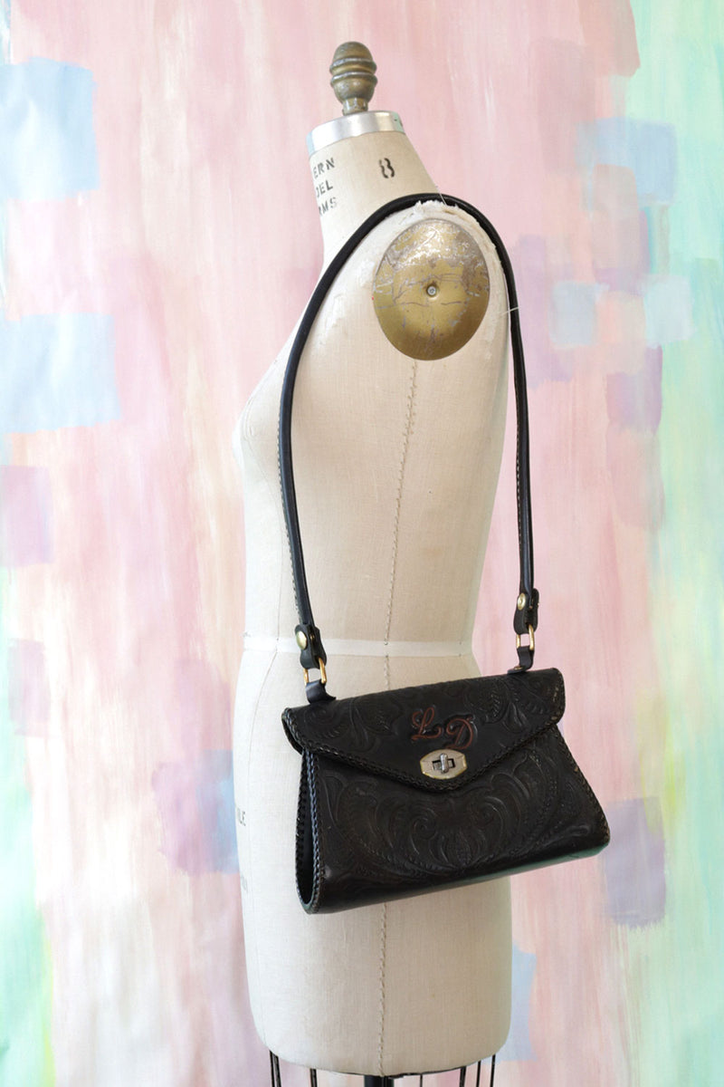 Black Tooled Leather Crossbody Bag