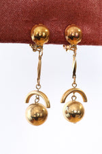 Brassy Planetary Dangle Clip Earrings
