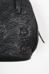 60s tooled leather bag detail