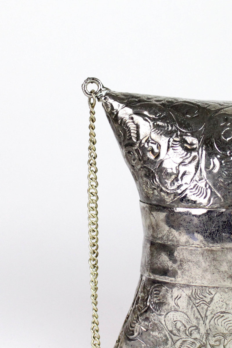 etched metal evening bag detail