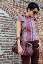 oversized maroon leather clutch