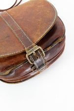 Distressed Leather Crossbody Saddle Bag