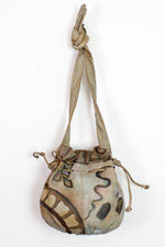 painted bucket bag