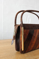 Gail Snakeskin Brass Frame Bag