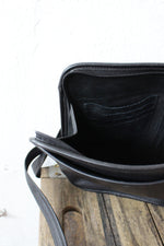 Sideways Black Leather Bucket