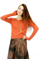 orange cable knit sweater