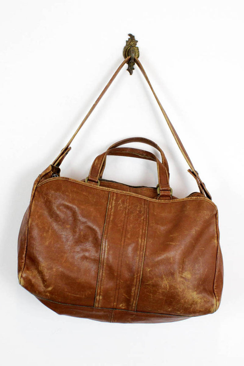 distressed duffel bag