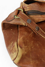 distressed duffel bag