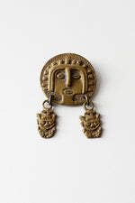 Face Off Brass Pin