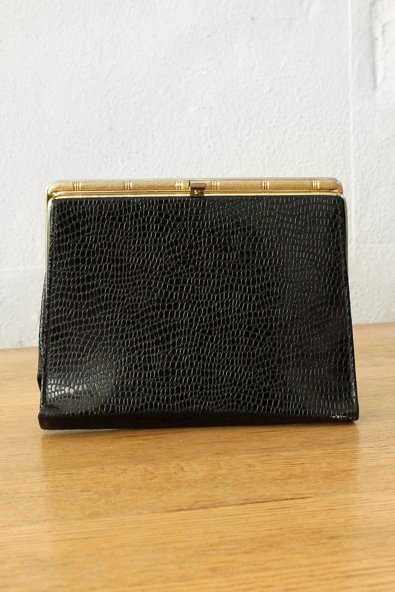 Embossed Brass Frame Clutch