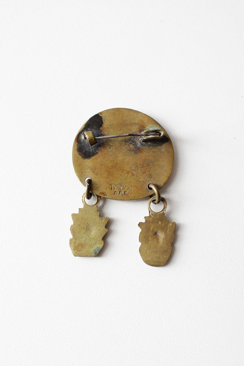 Face Off Brass Pin