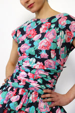 Rosy Ruched Peplum Mini S