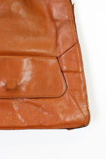 orange leather purse