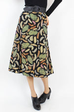 feathers on silk skirt L
