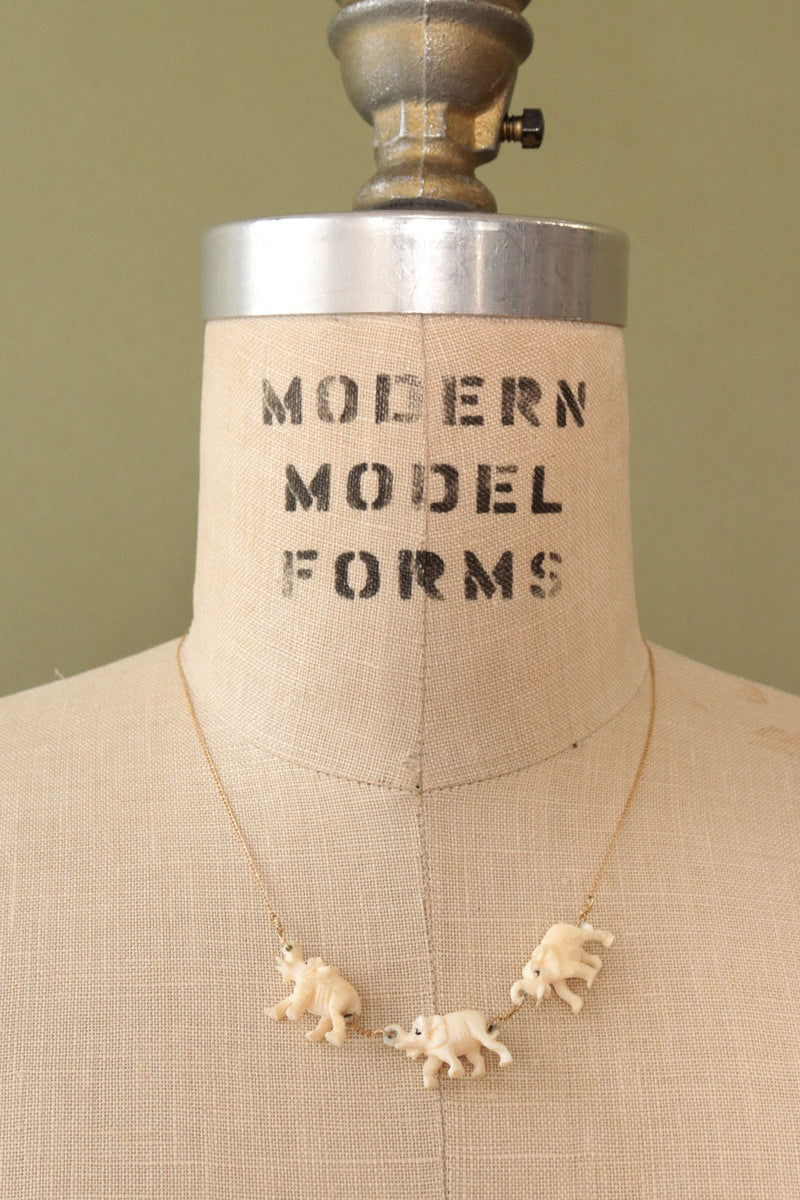 Marching Elephants Gold Necklace