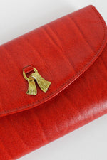 vintage leather wallet with metal clasp